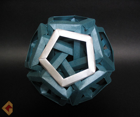 Six Interlocking Pentagonal Prisms designed by Daniel Kwan and folded by Grzegorz Bubniak